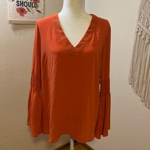 Michael Kors Orange Large V-neck blouse.